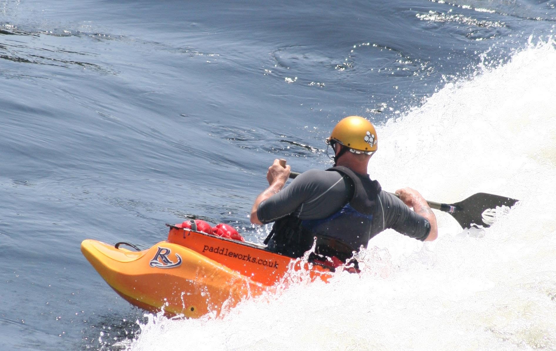 Chris Noble paddling a Riot Astro OC1 in Spain