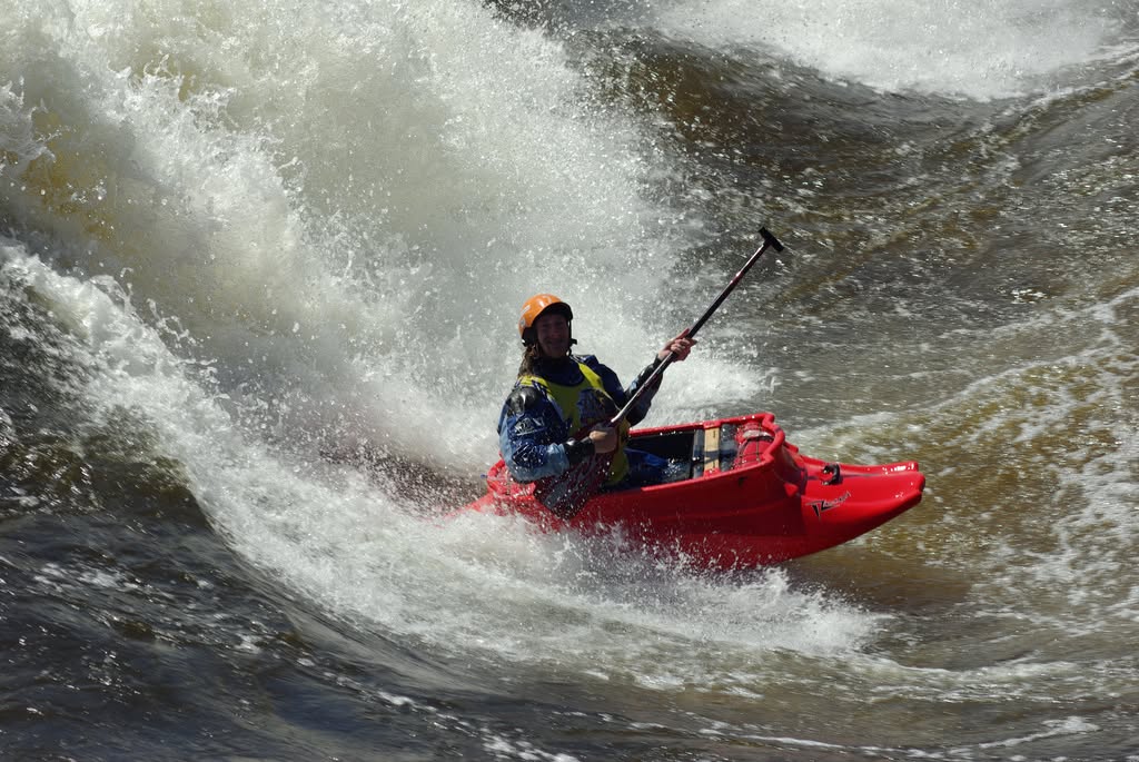 Stephan Paetsch surfing the enormous Bus Eater wave in an open canoe in 2007