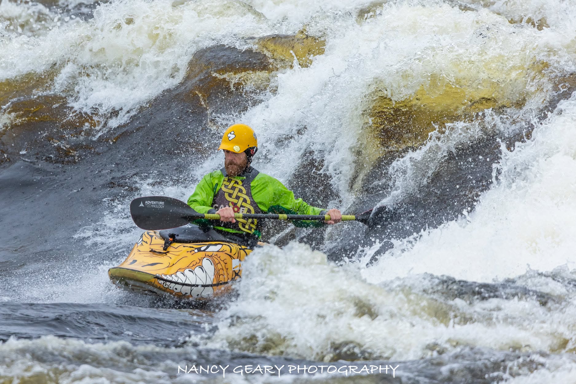 Tom Dunphy paddling K1 at Curragower Wave in Limerick, Ireland